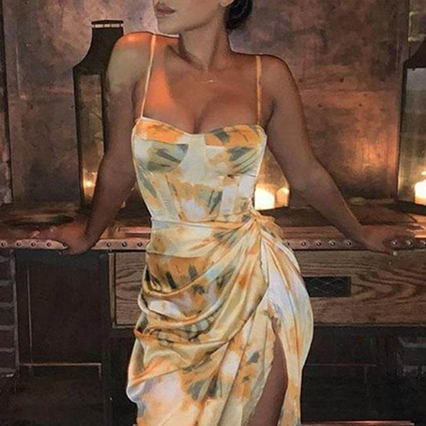 Summer Sexy Sling Dress showcasing stylish sling design and vibrant print, perfect for warm-weather occasions.