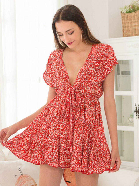Ivy Lane Floral V-Neck Cap Sleeve Dress with red floral pattern, featuring a flattering V-neckline and tie detail.
