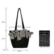 Big Bow Crossbody Bag with oversized bow, black, dimensions shown, suitable for leisure travel.