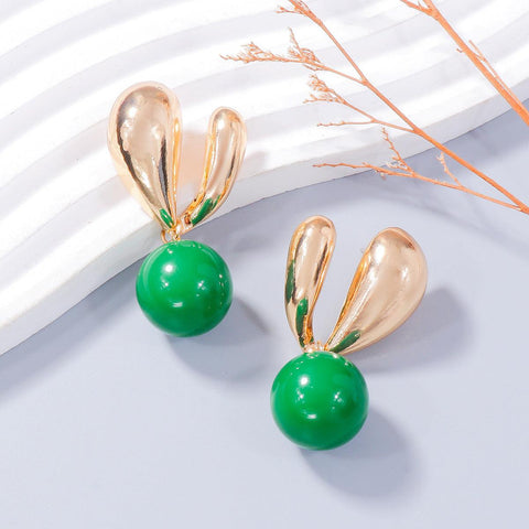 Alloy Drip Oil Bunny Earrings with green spheres and gold accents.