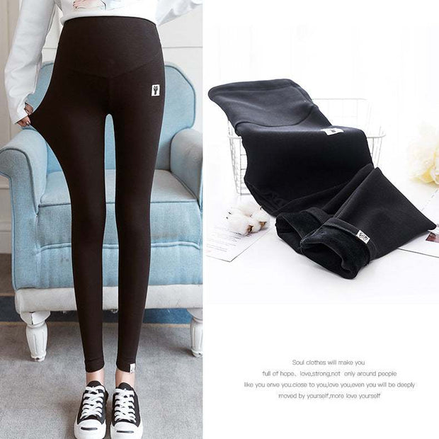 Fleece-lined maternity leggings with cozy waistband and snug fit.