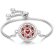 Hollow Stainless Steel Aromatherapy Bracelet with heart design, adjustable chain, and essential oil compartment.