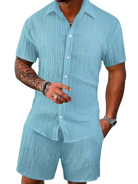 Plus Size Button Down Shorts Set in light blue, featuring a short-sleeve shirt and matching shorts, ideal for casual comfort and style.