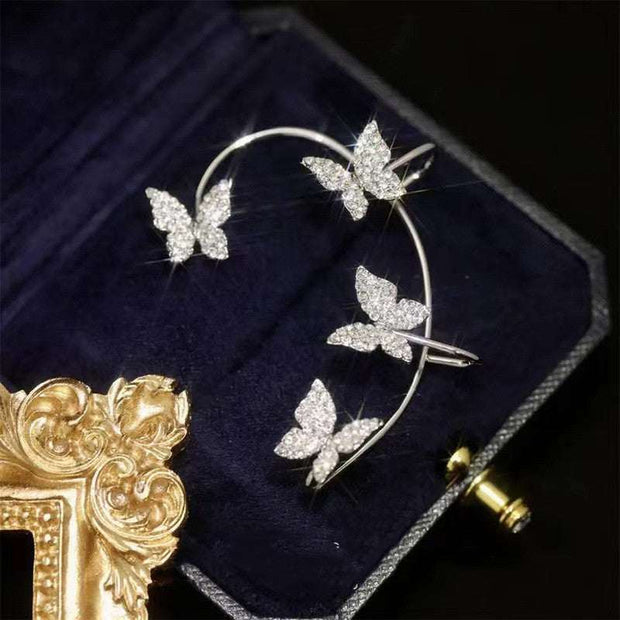 Butterfly Ear Clip Earrings with sparkling embellishments.