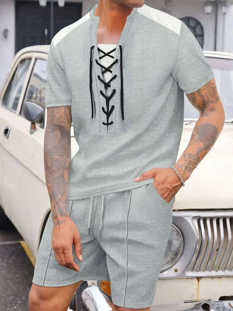 Waffle Knit Top and Shorts Set with lace-up neckline, relaxed fit, and drawstring shorts.