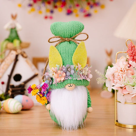 Easter Knit Faceless Doll with floral accents and bright colors on a festive spring background.