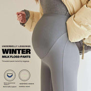 Fleece-lined maternity pants for expectant mothers, featuring stretchy waistband and warm fleece lining.