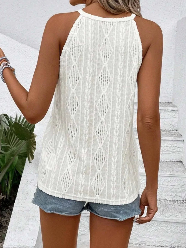 Textured round neck tank with intricate fabric design, casual wear.