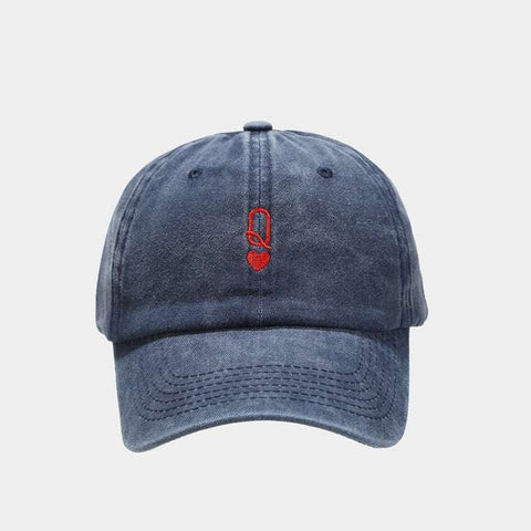 Vintage baseball cap with washed-out look and red embroidery, adjustable strap, navy blue color.