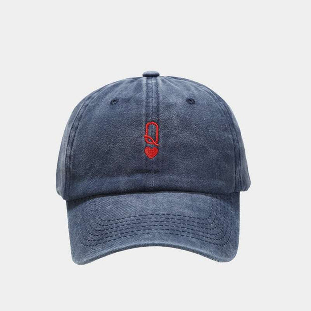 Vintage baseball cap with washed-out look and red embroidery, adjustable strap, navy blue color.