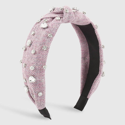 Heart Diamond Headband with sparkling diamonds on purple cloth, elegant women's accessory.