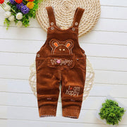 Children overalls with cartoon pattern and adjustable straps on a white background.