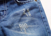 European style boys' ripped jeans with distressed detailing.