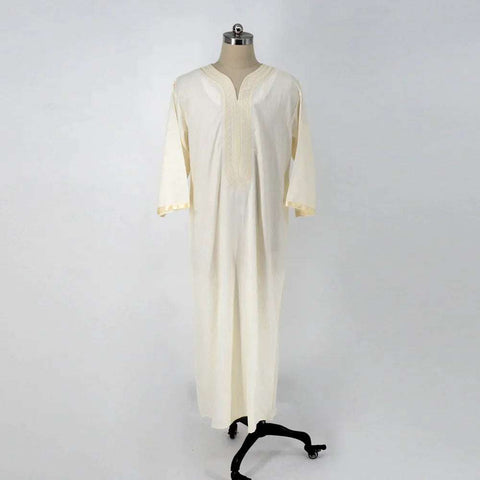 Embroidery White Muslim Robe with intricate embroidery, showcasing elegant and modest style on mannequin.