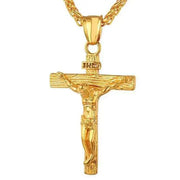 Elegant gold cross necklace with intricate design, symbolizing faith and devotion.