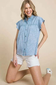 Lime N Chili Flutter Sleeve Button Down Shirt in mineral wash fabric, showcasing flutter sleeves and buttoned front, worn with white shorts.