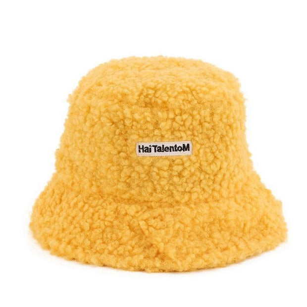 Lambswool Female Fishing Cap in soft yellow with retro style and short brim.