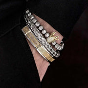 Handmade men's crown bracelets with gold-plated charm, stainless steel and Pave CZ beads.