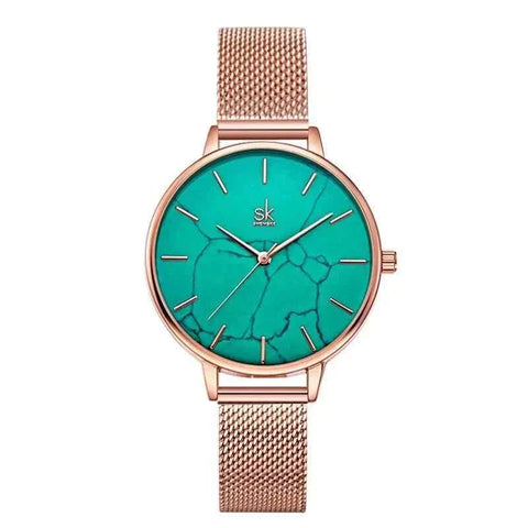 Shengke Fashion Watch with turquoise face and rose gold mesh band.