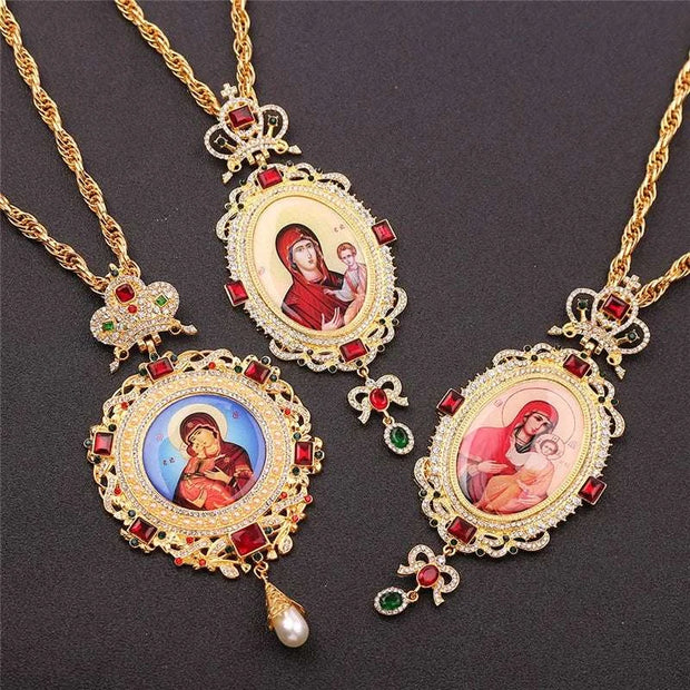 Orthodox Jesus Cross Pendant with intricate designs and adjustable chain.