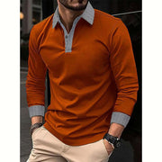 Long-sleeve polo shirt with plaid pattern and patch details in orange color.