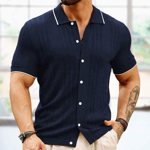 Men's dark blue button down knitted shirt, short sleeves, lightweight fabric.