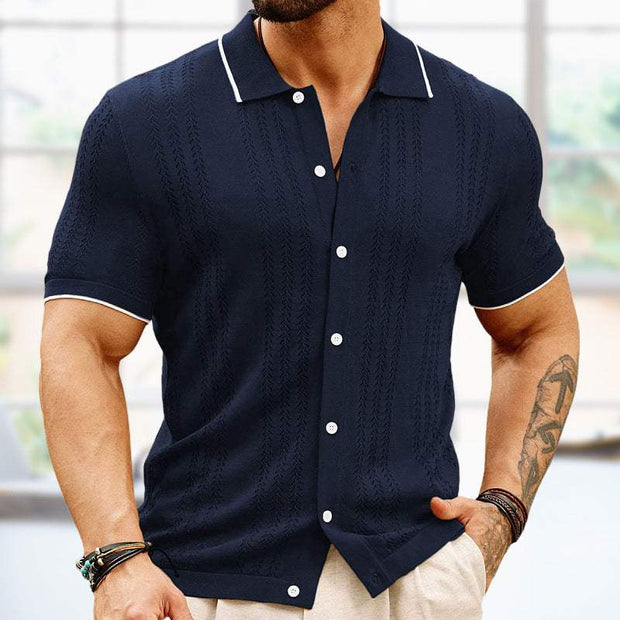 Men's dark blue button down knitted shirt, short sleeves, lightweight fabric.