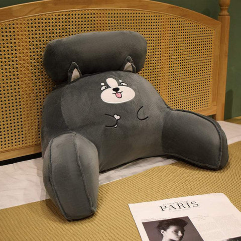 Fluffy Sofa Cushion Pillow with plush material on a wooden bed frame, ideal for comfort and style.