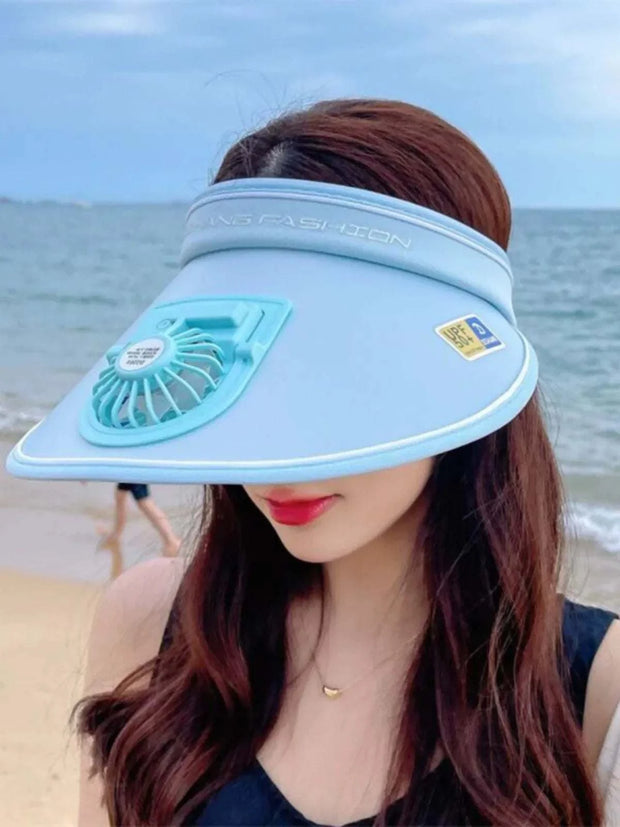 Women's UV protection fan hat with wide brim for sun protection and cooling breeze.