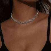 Fashion Love Necklace with silver heart pendant on woman's neck.