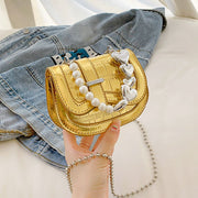 Laser Pearl Girl Tote with heart accents and denim background.