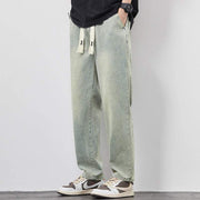 Washed wide leg jeans with drawstring, relaxed fit in light blue denim.