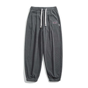 Straight-leg Sweatpants with adjustable drawstring, dark gray color, suitable for casual wear.