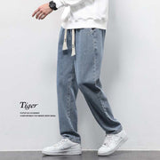 Washed Wide Leg Jeans in light blue, showcasing relaxed fit and vintage-inspired finish.
