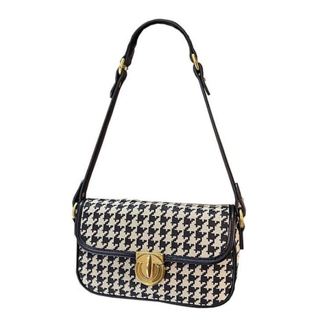 Houndstooth Baguette Bag with classic pattern and gold clasp.