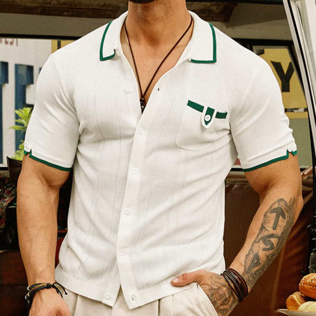 White short-sleeve pocket sweater with green trim and classic silhouette.