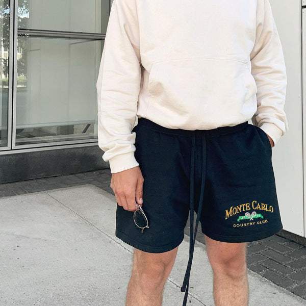 Black Printed Casual Shorts with elastic waistband, offering comfort and style for summer occasions.