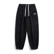 Black straight-leg sweatpants with drawstring waist for comfort and style.