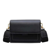 Black Square Chain Shoulder Bag with gold chain strap, modern design, compact size.