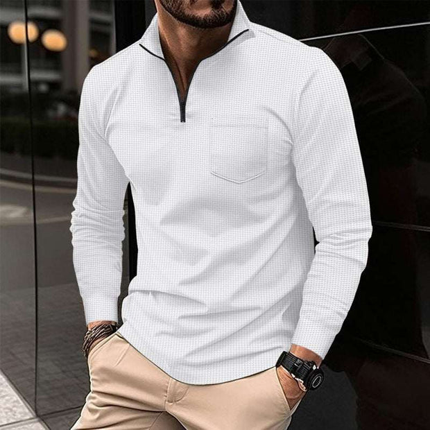 White waffle textured sports polo shirt with long sleeves and zipper decorations.