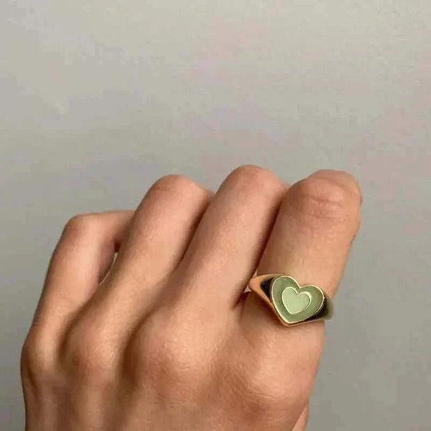 Creative Love Heart Ring on finger with unique heart-shaped design, crafted from high-quality alloy.
