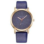 Elegant Full Star Womens Watch with blue leather band and gold-tone case.