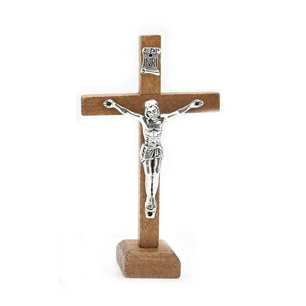 Wooden Jesus Cross with stand featuring intricate detailing and a warm finish, ideal for home or office decor.