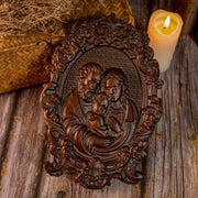 Religious Holy Family Wooden Icon with intricate carvings, depicting Jesus, Mary, and Joseph; ideal for home decor and spiritual reflection.