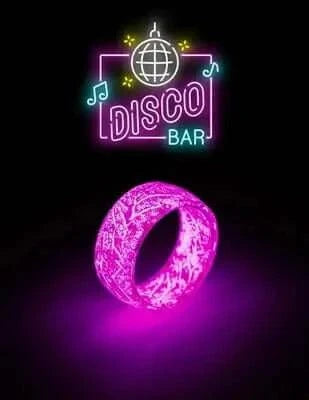 Unisex Luminous Ring glowing in dark at a disco bar setting.