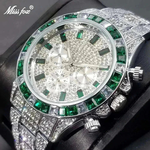 Luxury diamond calendar watch with green accents and elegant design.