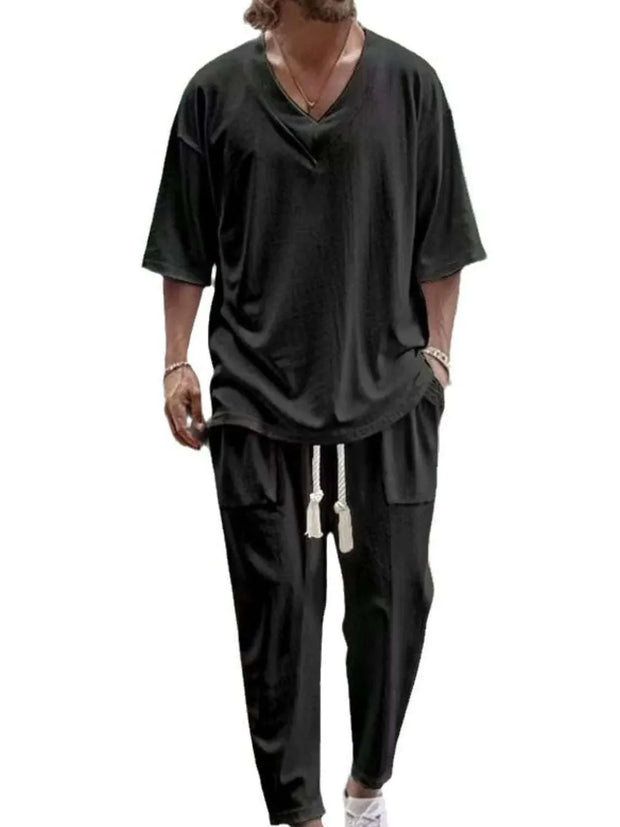 V-Neck Half Sleeve Top and Pants Set in black, featuring a stylish relaxed fit for men.