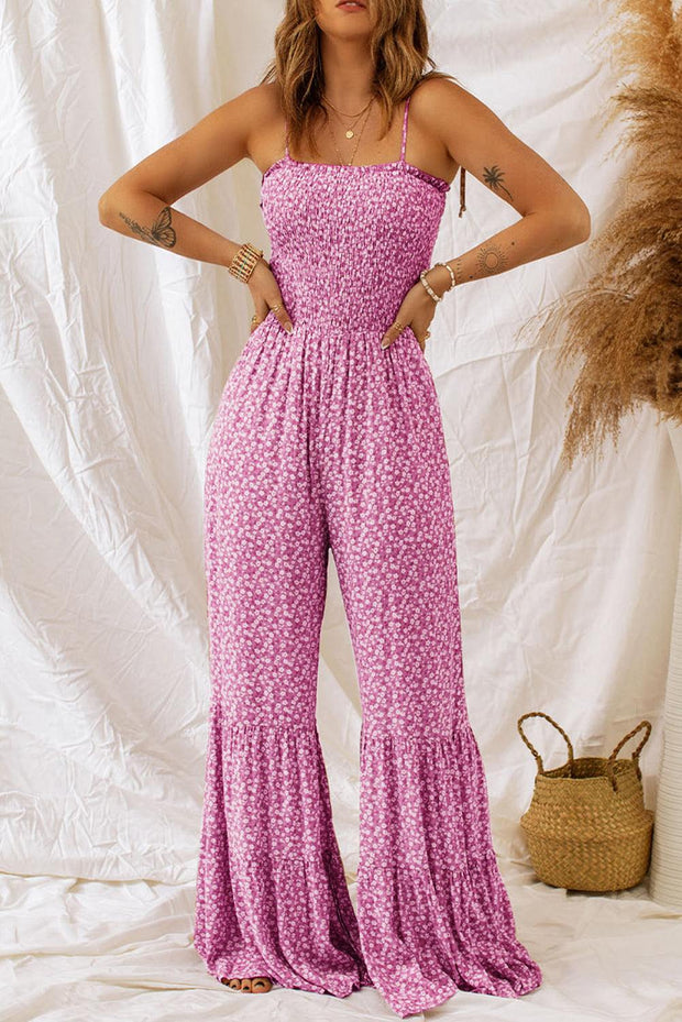 Dusk Blue Floral Jumpsuit with smocked bodice and wide-leg design on a model.
