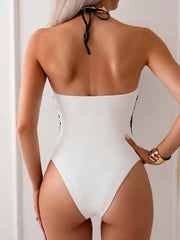 Contrast Cutout Halter Neck One-Piece Swimwear in white with black accents, featuring sleek cutouts for a stylish beach look.