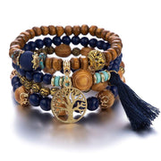 Boho Wooden Stretch Bracelet with polished beads and tassel charm.